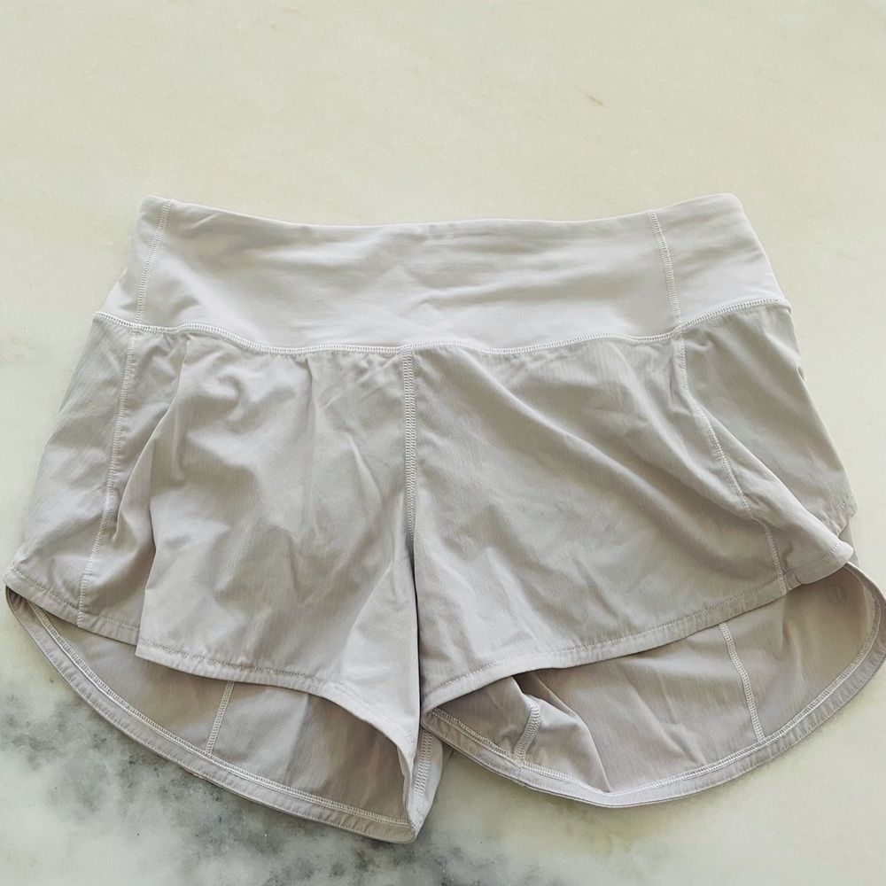 Lululemon Speed Up Mid Rise shorts 4”